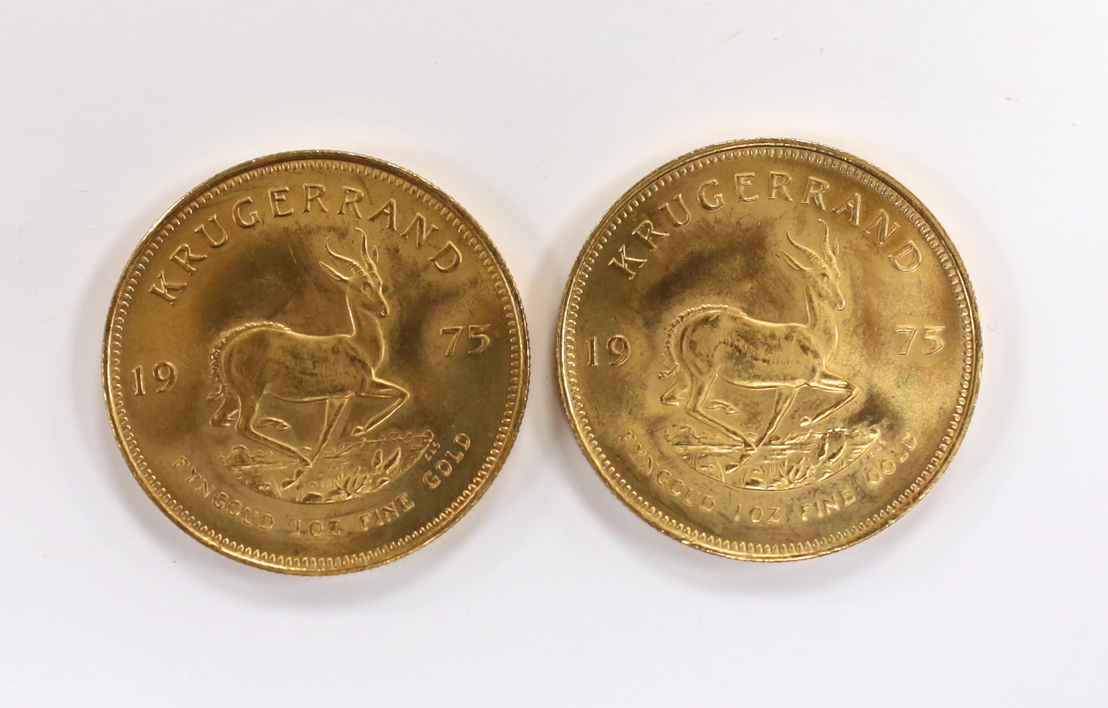 Gold coins, South Africa, two gold 1oz. Krugerrands, 1975, near UNC (2oz.)